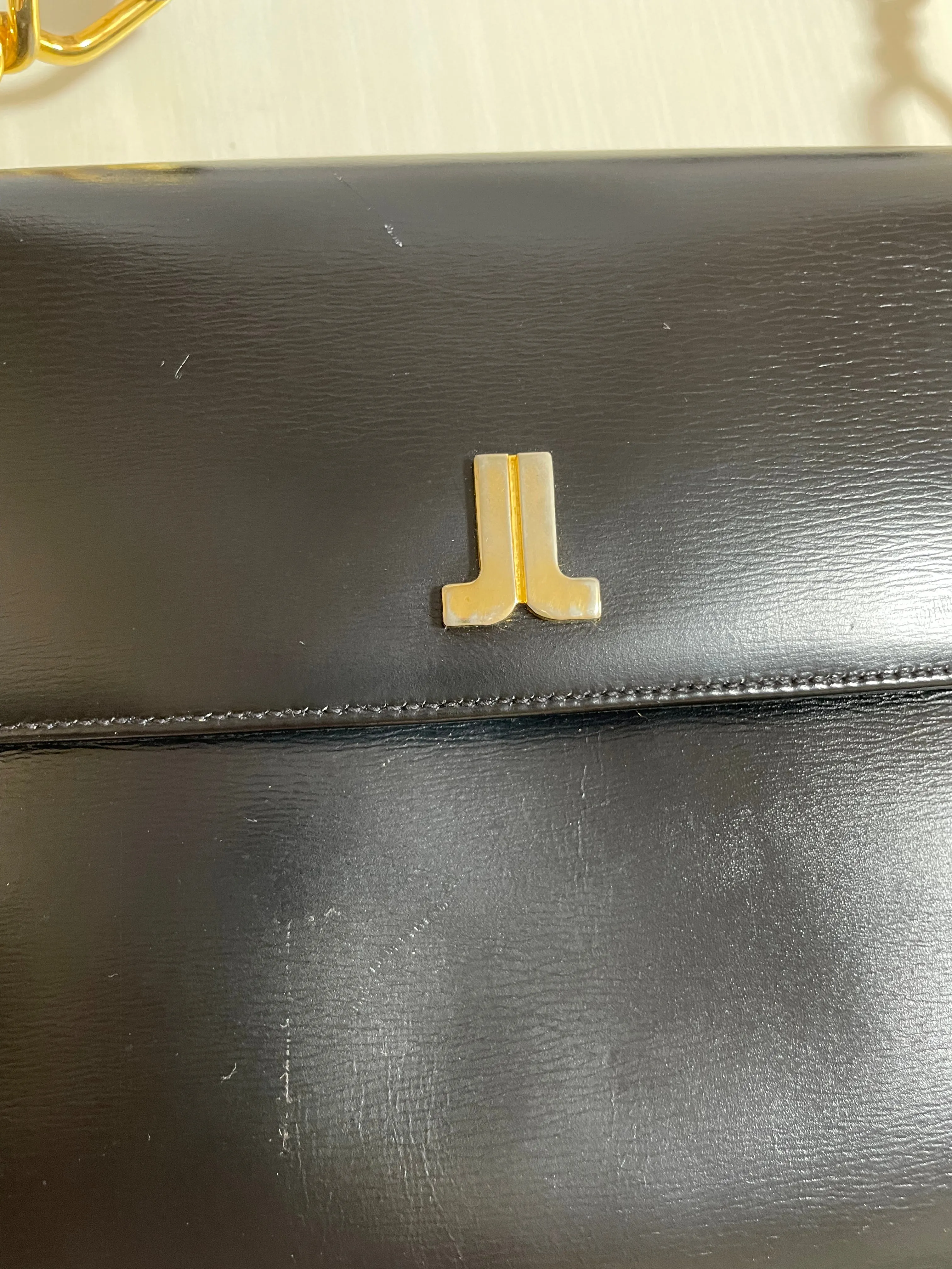 Vintage Lanvin black leather shoulder bag with logo motif. Classic masterpiece. 050320r11