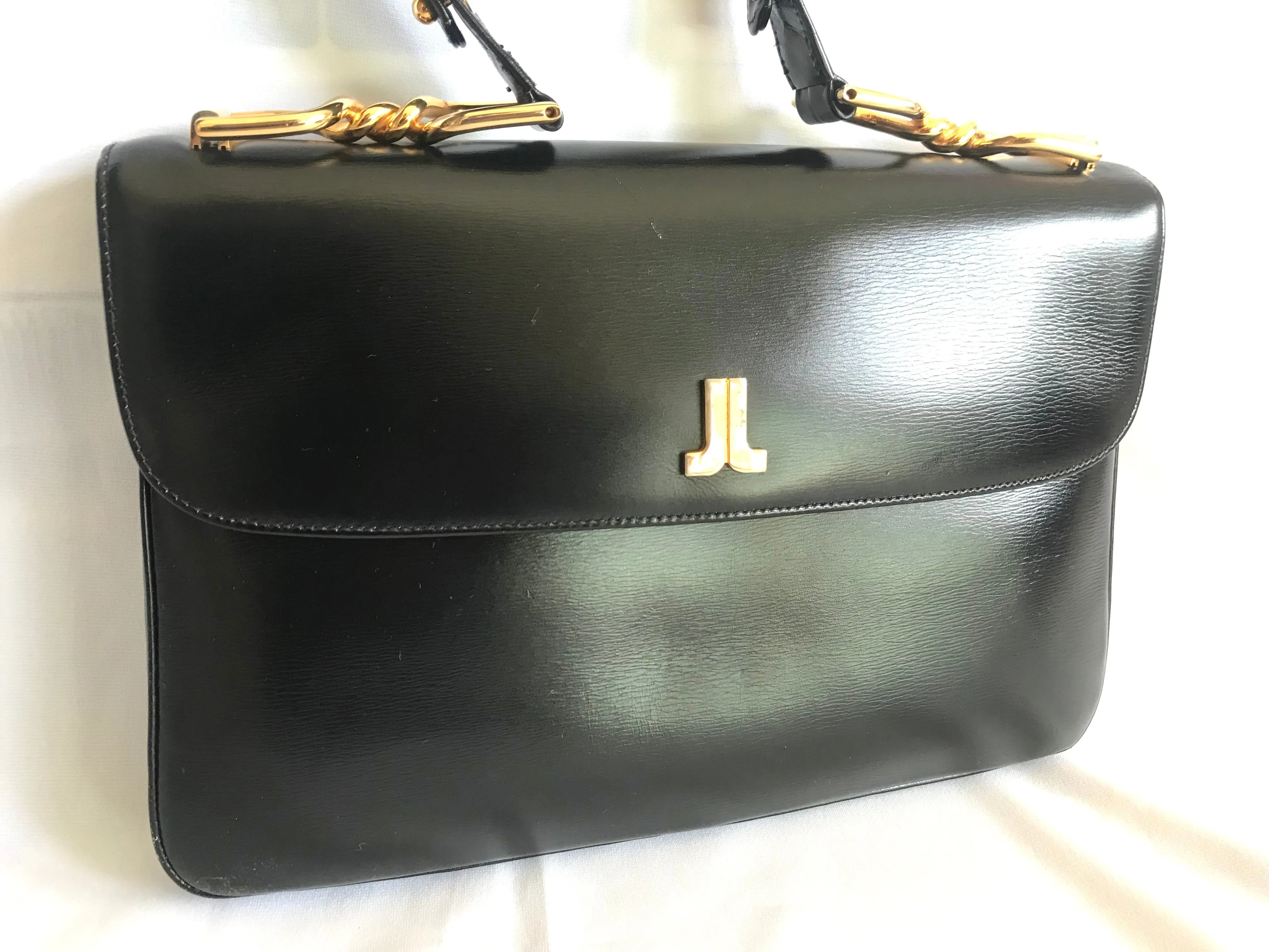 Vintage Lanvin black leather shoulder bag with logo motif. Classic masterpiece. 050320r11